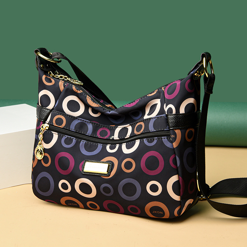 Bolsa de mujer 2023 nueva bolsa de mensajero de hombro de tela Oxford impermeable bolsa de Madre de mujer de mediana edad de gran capacidad multicompartimento