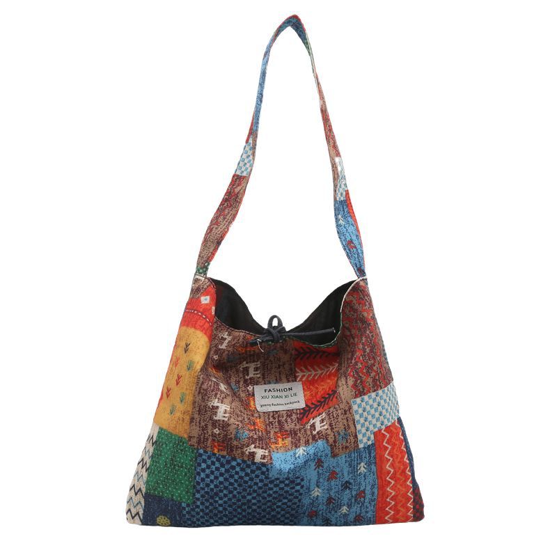 2025 primavera y verano estilo nacional denim tendencia nueva mochila de hombro de gran capacidad mochila de pulsación de la moda