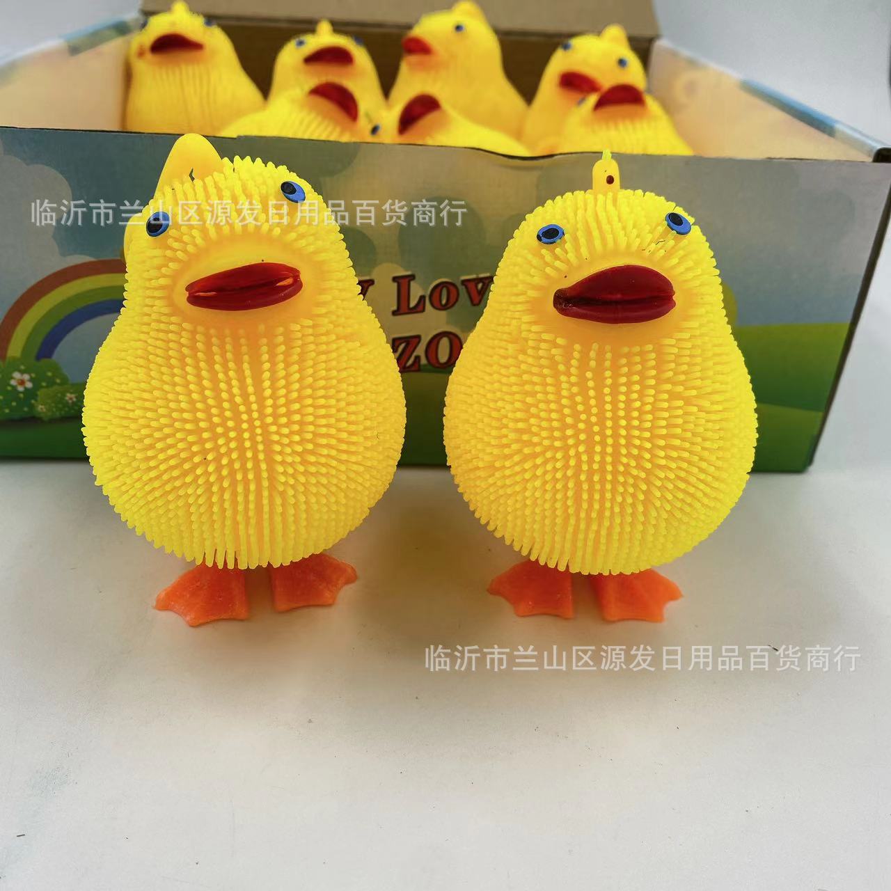 Juguete de dibujos animados flash emisor de luz pato amarillo emisor de luz bola de piel honda pato pollo pellizco música descompresión solución