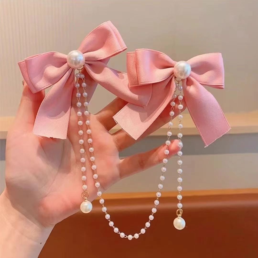 Niños broches de cabello de arco bebés mainstream público Sue joyeros de cabello de Año Nuevo niña perla roja tarjeta de cabello de Año Nuevo niña