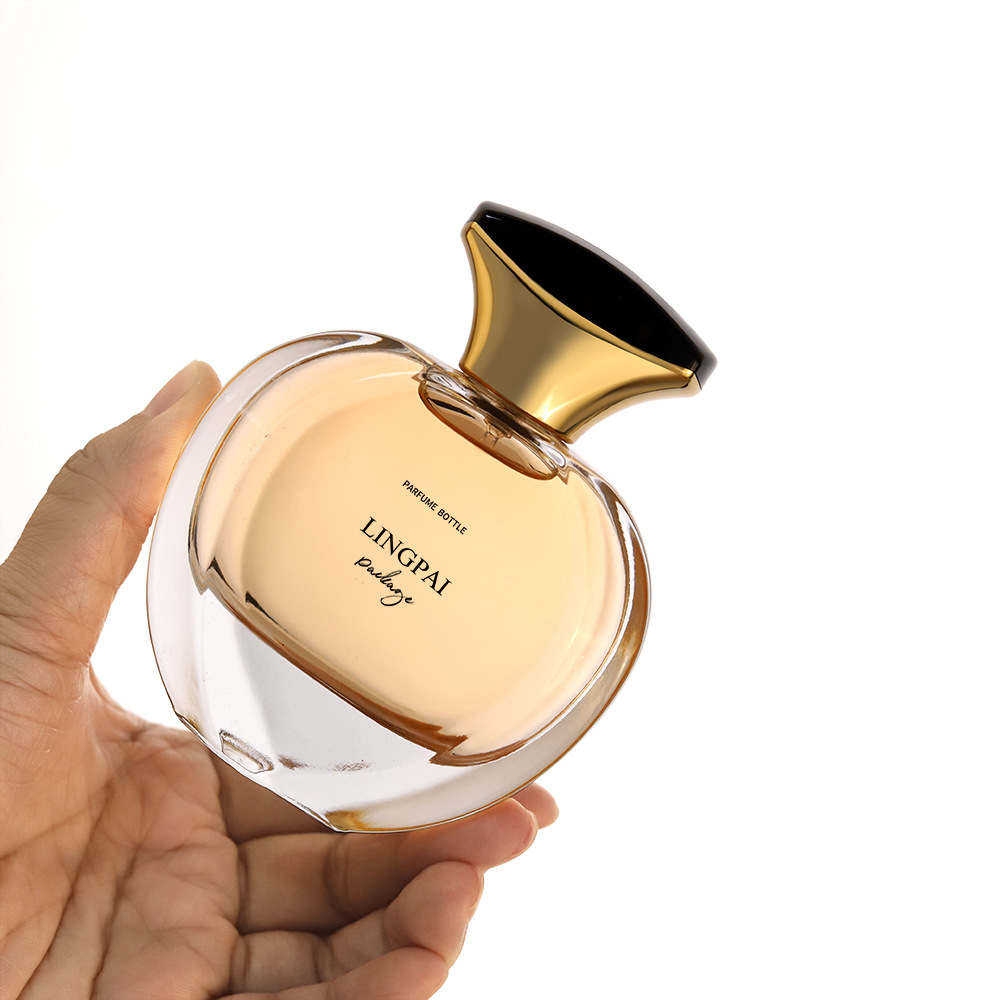 Botellas de perfume de fondo redondo y grueso de alta gama transfronterizas, botellas vacías de cosméticos de vidrio, botellas de spray de perfume de presión 50 ml