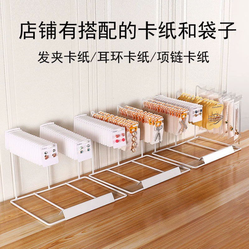 Стойка? Нет. Перевод: Stand, earrings, storage system, bracelet, necklace, hair accessory, simple and elegant design