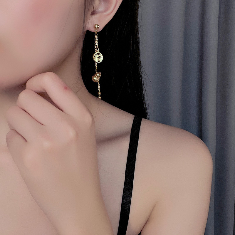 Pendientes de estilo étnico de la mujer pendientes largos de la borla del diseñador único nicho pendientes de temperamento retro pendientes