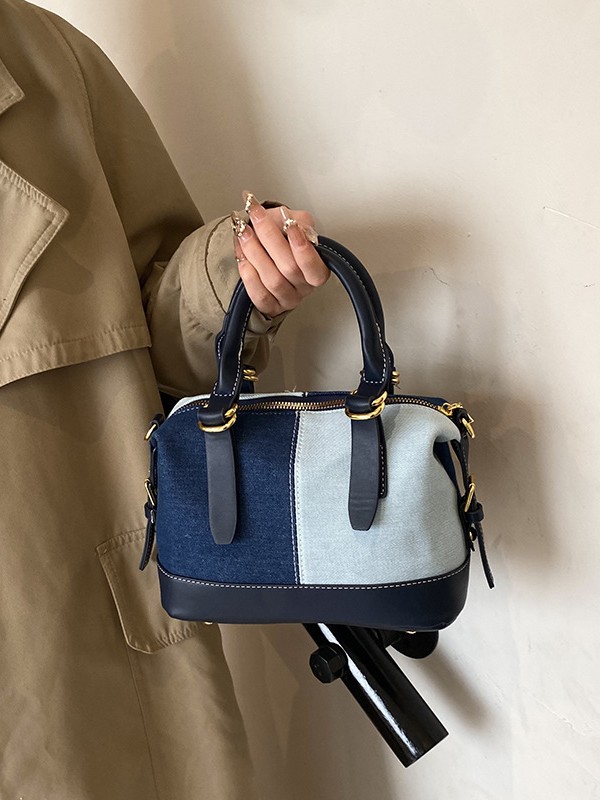 Alto nuevo bolso de almohada portátil para mujeres 2024 nuevo cross-border jeans color de empalme de hombro mochila
