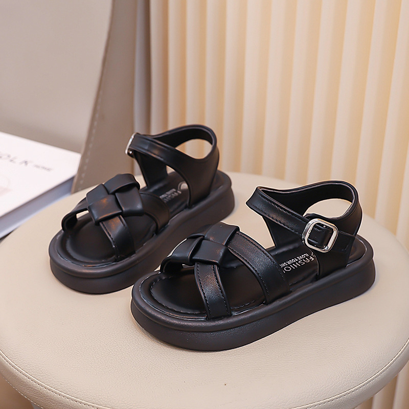 Zapatos de playa suaves para niñas 2026 verano nuevo estilo de moda infantil universal zapatos princesa huecos de dedos abiertos zapatos de moda romana