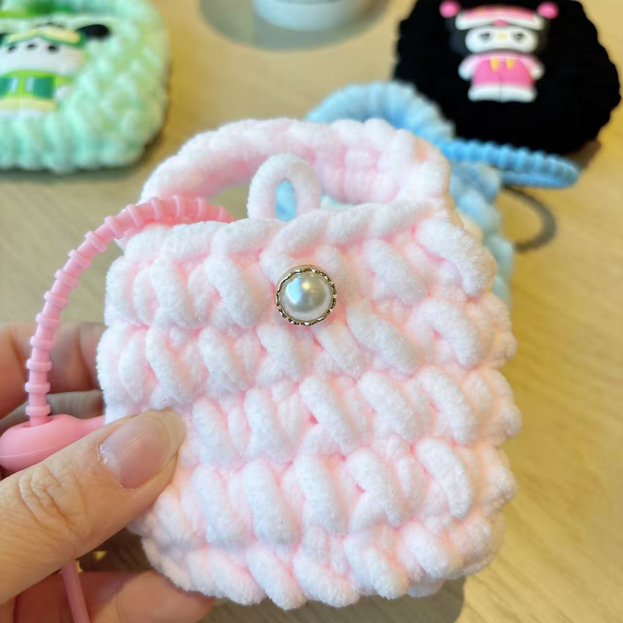 Creativo dibujos animados Kullomi lana trenzado bolsas de cambio llaveros auriculares portátiles lindos trenzados bolsa de almacenamiento regalo