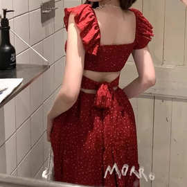 海边度假风红色波点连衣裙女装秋季2026新款系带收腰显瘦A字长裙
