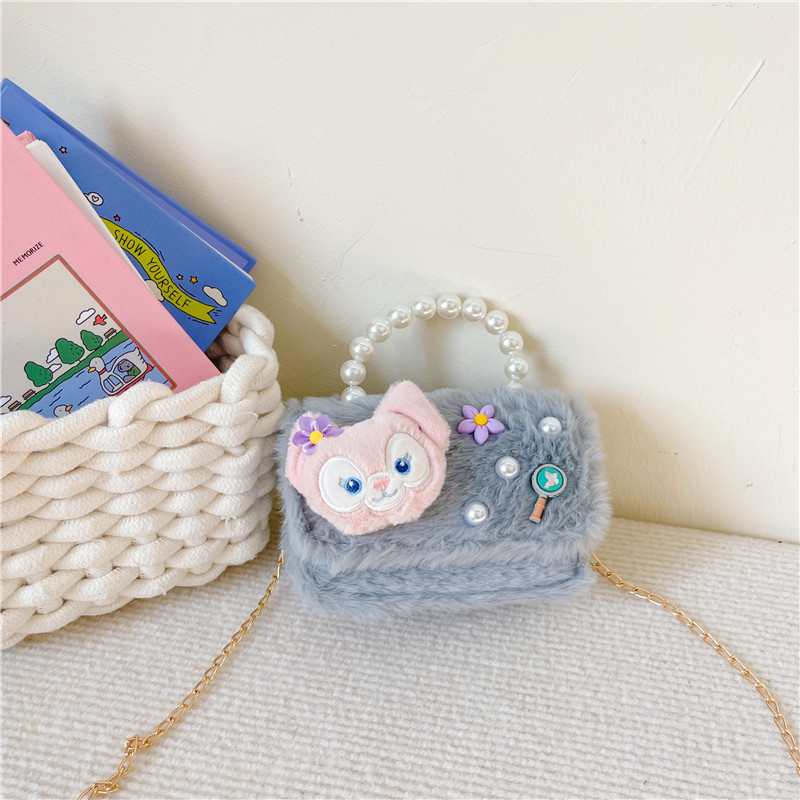 Chanel estilo princesa flor accesorios bolsa conejito bolso de hombro del niño Bolsa de felicitación de Año Nuevo estilo coreano bolsa de mensajero de los niños de dibujos animados