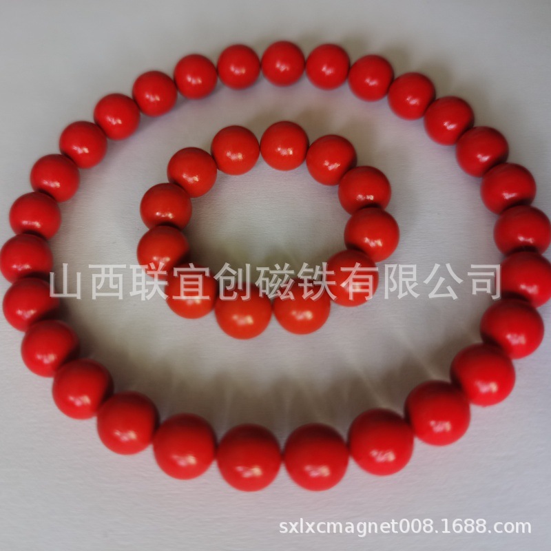 供应6mm稀土无绳磁灸石项链 珊瑚红耳钉  无绳自吸手链磁能珠