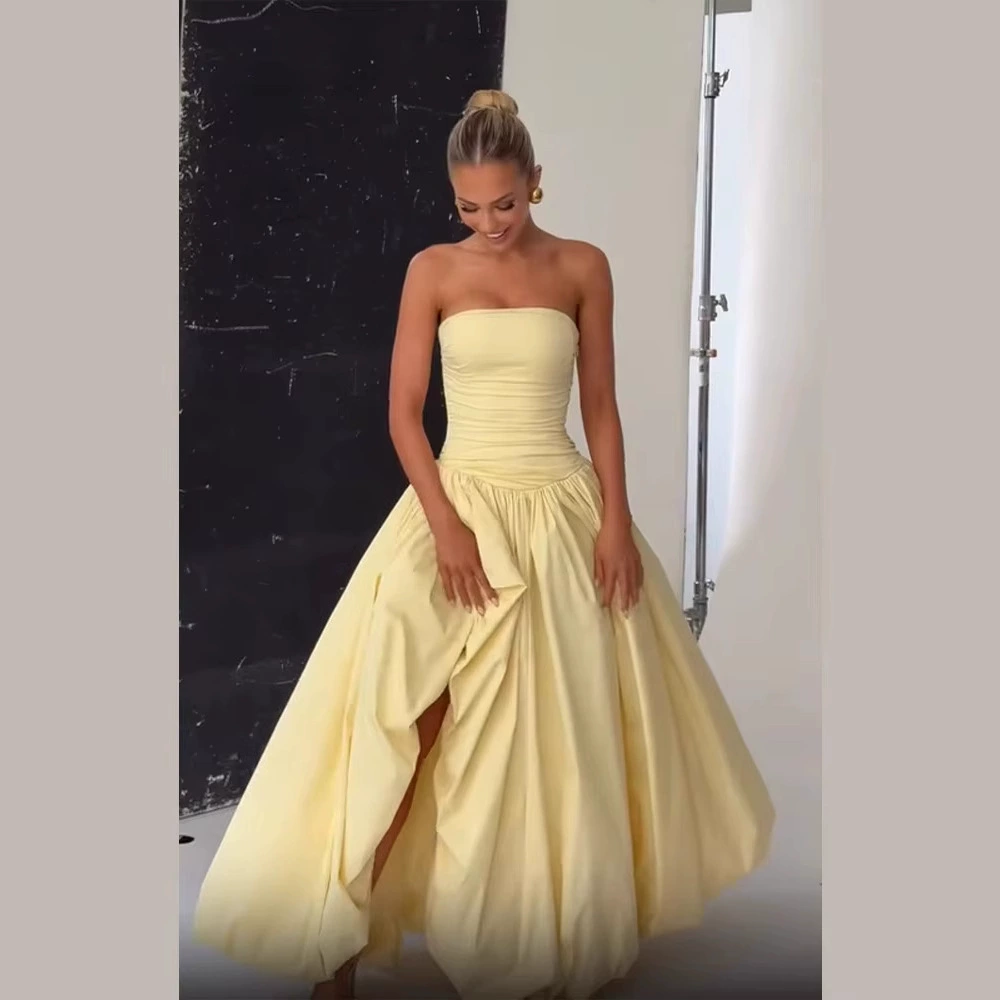 Европейские и американские трансграничные 2025 новые летние платья для женщин Сексуальные тряпки сплошные цвета с открытым вилкой темперамент элегантное платье для женщин