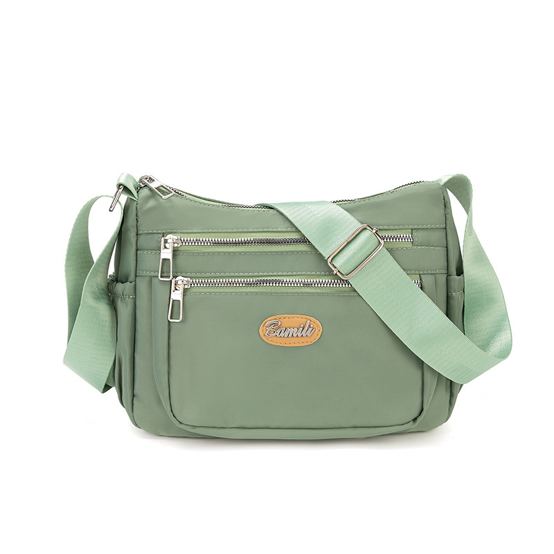 Bolso explosivo, tela de nailon para mujer, bolso de mensajero casual de gran capacidad, bolso de hombro ligero simple para madre de mediana edad para mujer