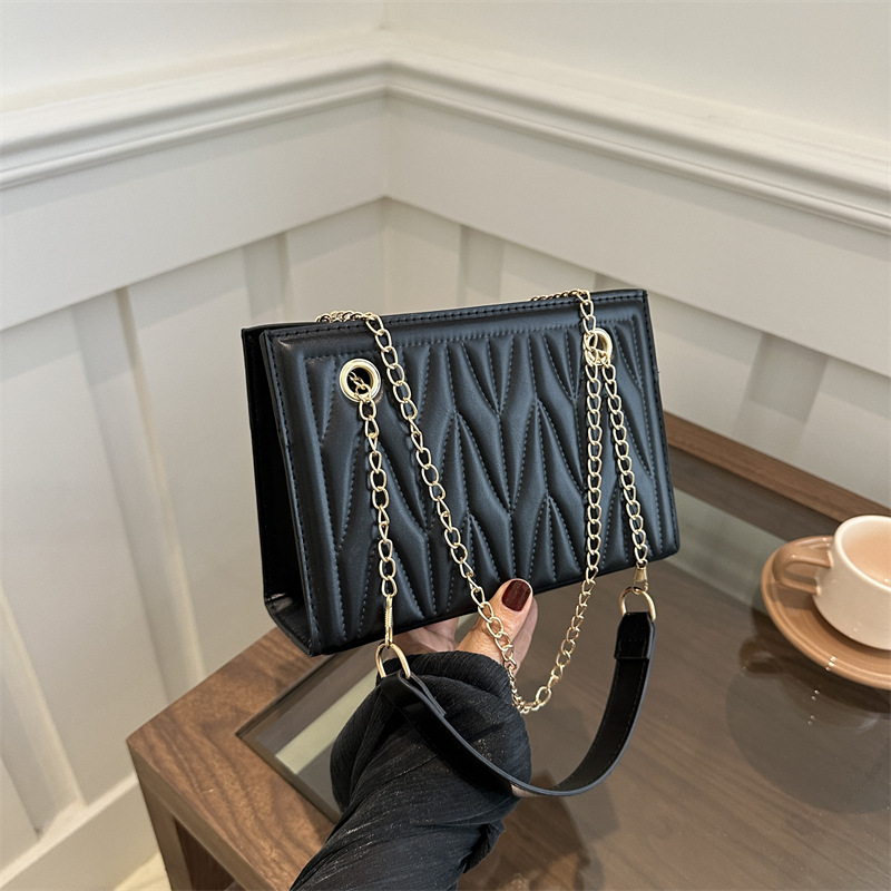 Bolsa de cadena de textura de alta calidad para mujer 2024 nueva moda rombo viajero de un solo hombro mensajero de nicho bolso cuadrado pequeño Tote