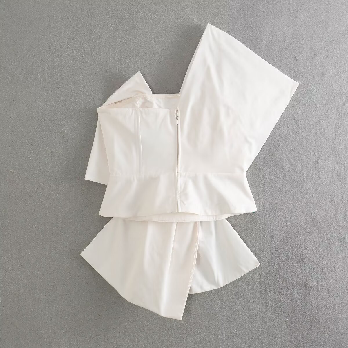 Spring asymmetrical bra top with bow