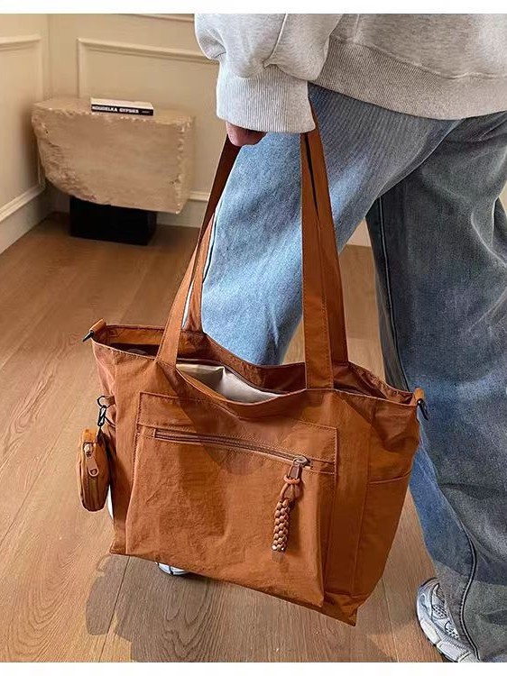 Transfronterizos casuales de color sólido nylon bolso de mano nueva bolsa de tela de transporte de gran capacidad simple y ligera mochila de hombro