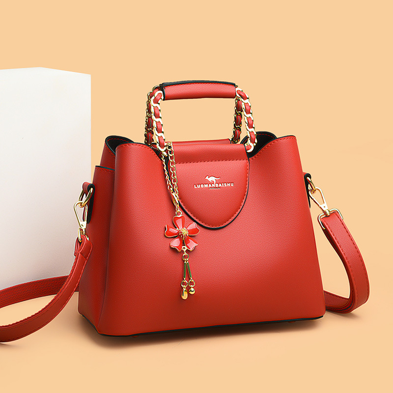 Nueva moda de hombro de las mujeres costura pequeño tamaño exquisito cubo bolsa de gran capacidad de cuero suave de una sola pieza de entrega para mamá más joven