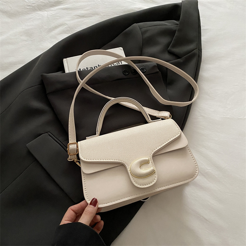 Trendy de verano 2025 nuevo bolso cuadrado pequeño de color en contraste bolso de moda bolso diagonal portátil de textura occidental de todo fósforo para mujer