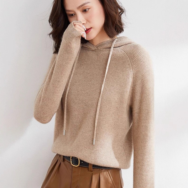 Knitted sweater with hood