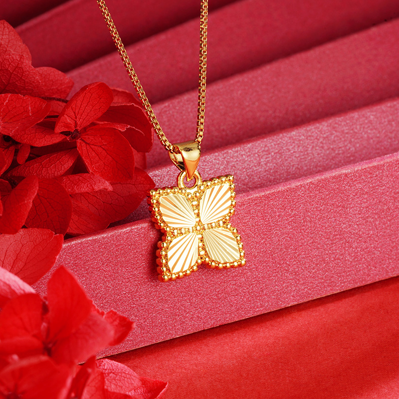 Oro trébol de cuatro hojas colgante antiguo chapado en oro de la flor de las mujeres elegante todo partido transmisión en vivo caliente suministro al por mayor Yiwu