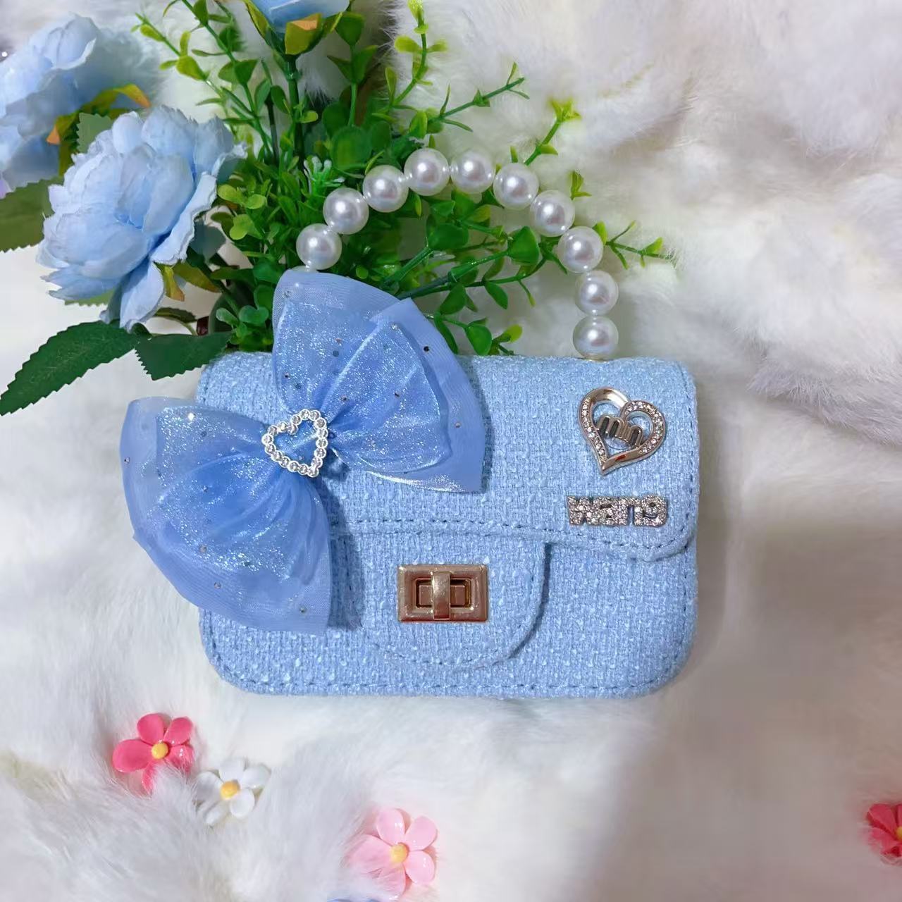 Nuevo tipo de bolsos para niños, bolsos de moda, bolsos de princesa de viento, bolsos portátiles lindos para chicas, bolsos de red para bebés.