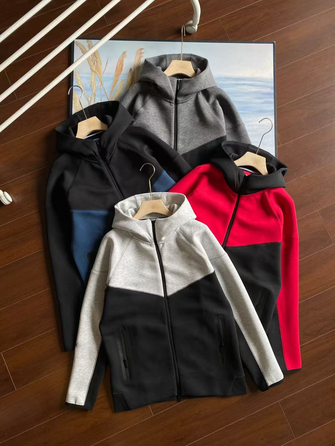 25 años primavera y otoño nuevo estilo casual deportes capa de aire chaqueta y traje de pantalón 54 y 61 traje suelto