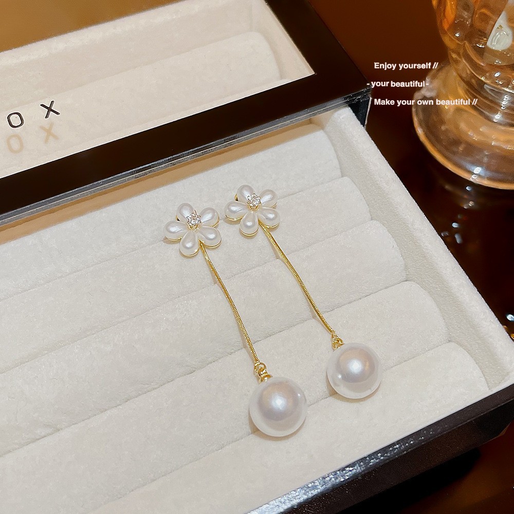 S925 aguja de plata elegante borla pendientes de alta gama simple cara de adelgazamiento pendientes de todo fósforo estilo coreano nuevos pendientes de moda al por mayor