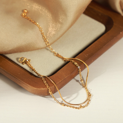 Minimalist style niche elegant temperament personalized jewelry bead chain snake bone chain double stacking style titanium steel gold-plated bracelet