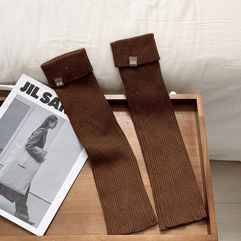 Piles de calcetines de viento de color sólido de otoño y invierno versátil engrosado anillo de calcetines engrosadas calcetines calientes no caen al por mayor