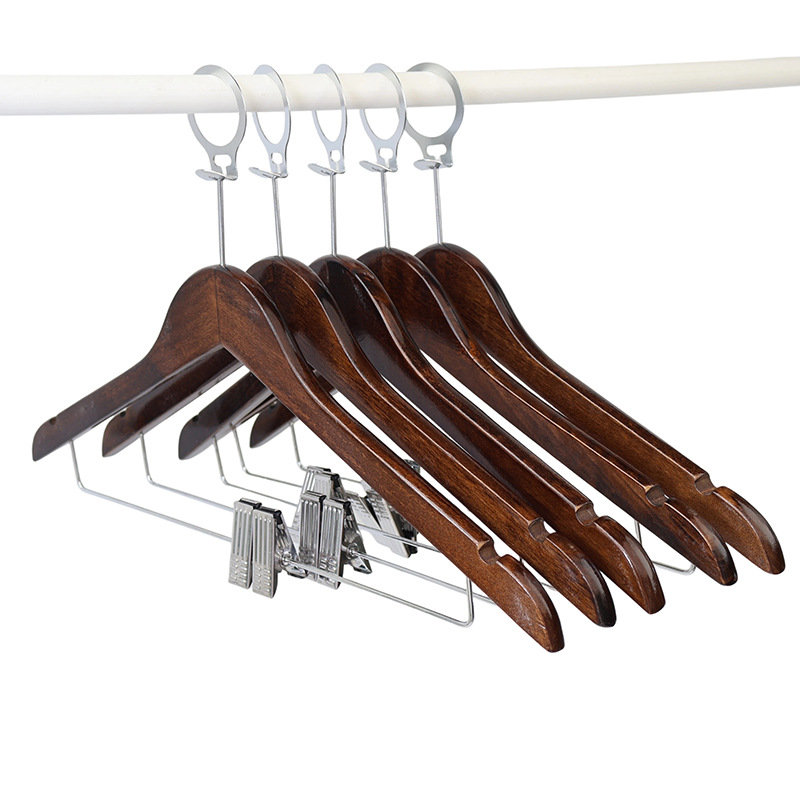 Perchas de madera maciza hotel tienda de ropa al por mayor madera doméstica soporte de ropa de madera sin rastros clip antideslizante para colgar ropa para adultos
