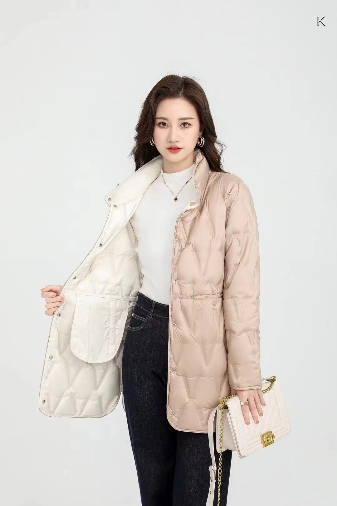 国境を越えた秋冬の新型ダウンジャケットの女性の中には、薄いサイズのゴムがあります。