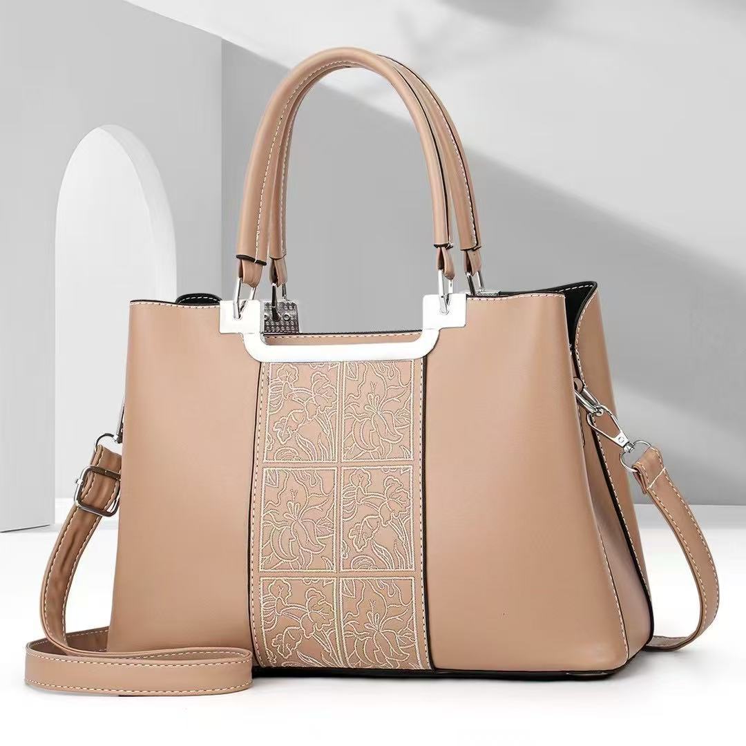 Bolso de madre atmosférico bolso de mujer simple de gran capacidad bolso de mensajero de hombro estilo explosivo bolso de marca de moda 2025