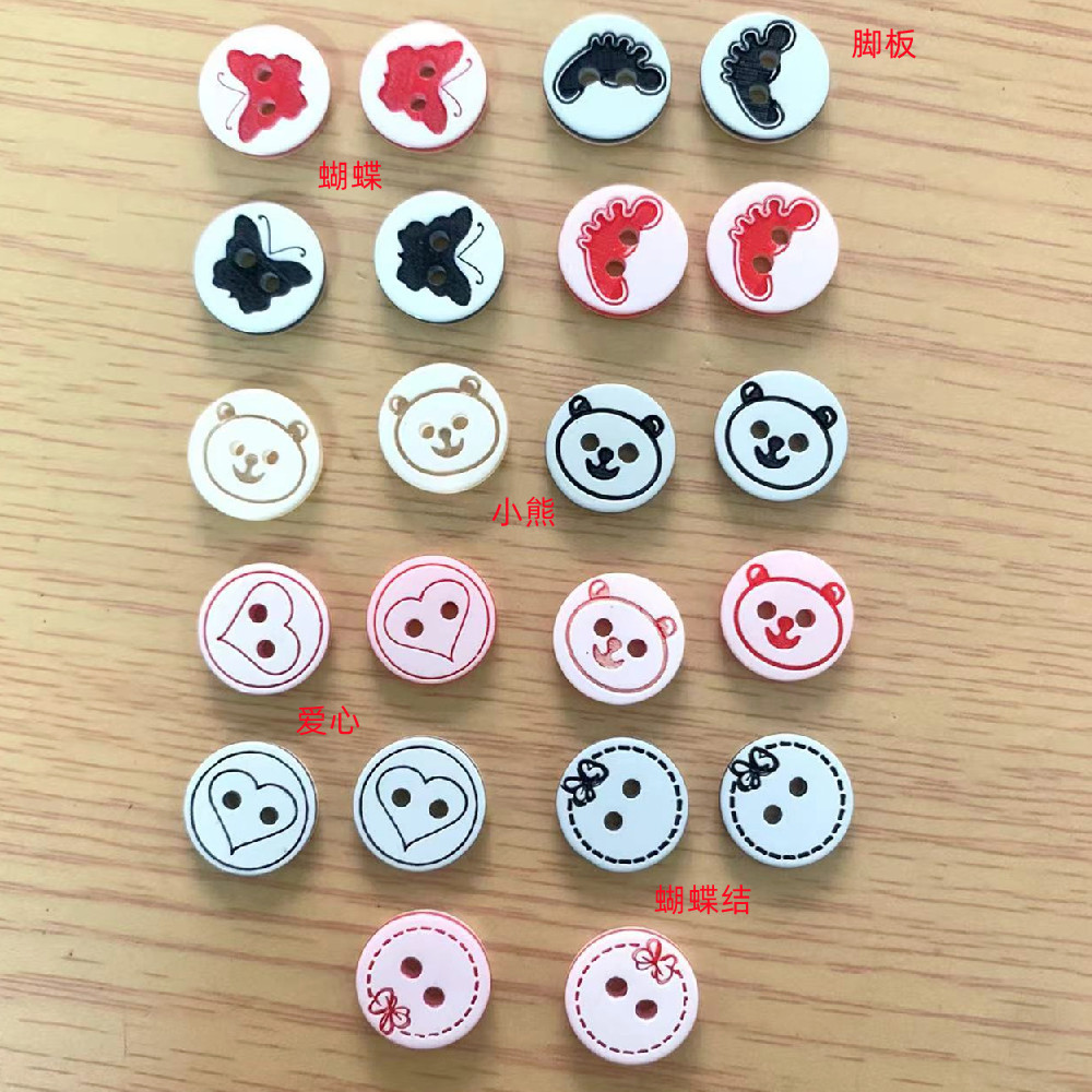 批发diy手工手缝2眼纽扣热卖可爱儿童装纽扣彩色树脂卡通钮扣