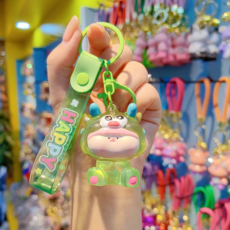 Caricatura Lilith dragón lindos colgantes de resina transparente bolsos de automóviles colgantes de llaves al por mayor