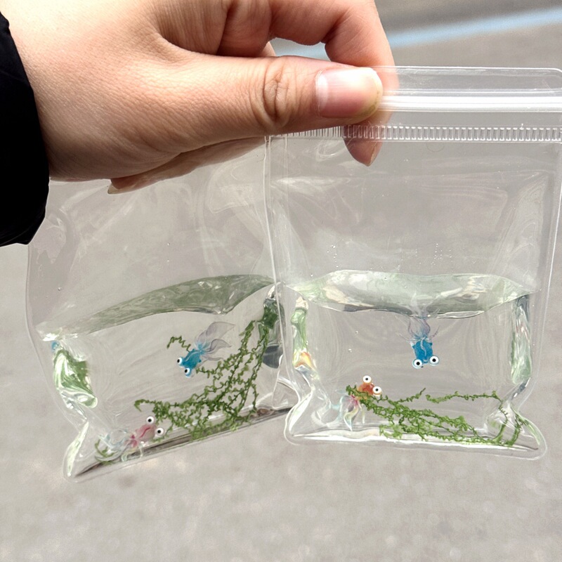 Creative simulation bag goldfish bag imitation water silicone pinch music small red book with hand decompression gift toy