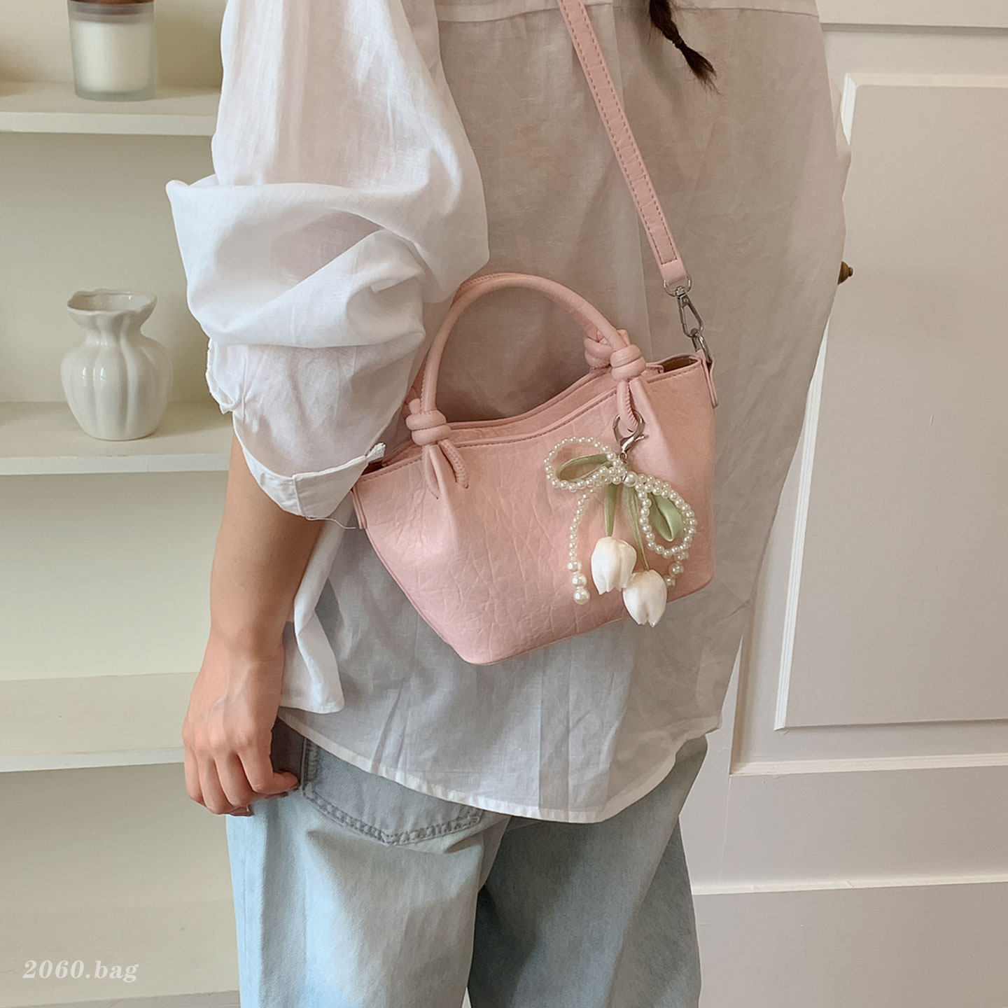 Bolsas plegadas coreanas femeninas super caliente de un solo hombro cubo de agua para viajar 2026 bolsas de mochila populares nuevos nichos de verano