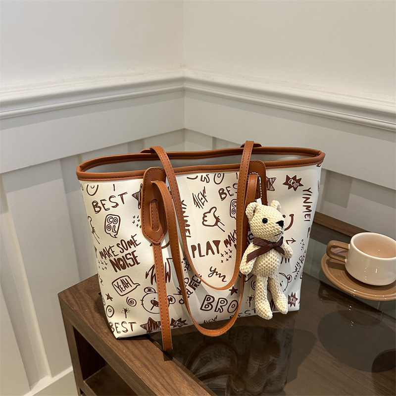 Cute casual oso estampado de gran capacidad 2024 nuevo estilo simple viajero de un solo hombro bolso portátil para estudiante bolso femenino