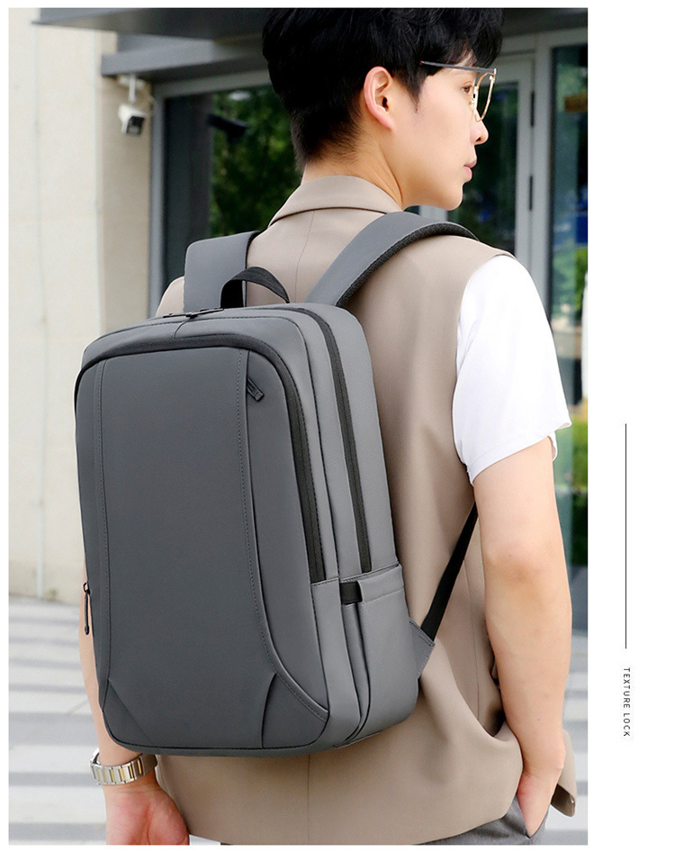 Large-capacity backpack men's new USB charging casual student school bag business commuting simple computer backpack_voghion.com