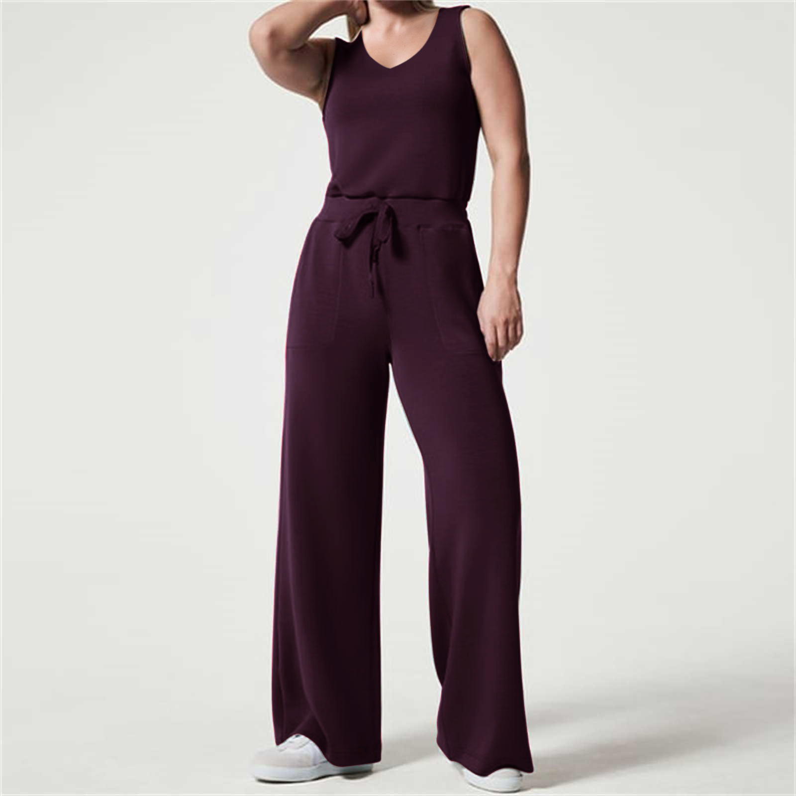 2023 primavera y verano nuevo versátil moda europea y americana adelgazamiento ocasional de las mujeres sin mangas color sólido V-cuello pantalones jumpsuit