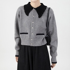 新しい色のファッションのゆったりしたニットのカーディガンの婦人服2025春と秋の小さい子の香風の長袖のセーターのコート