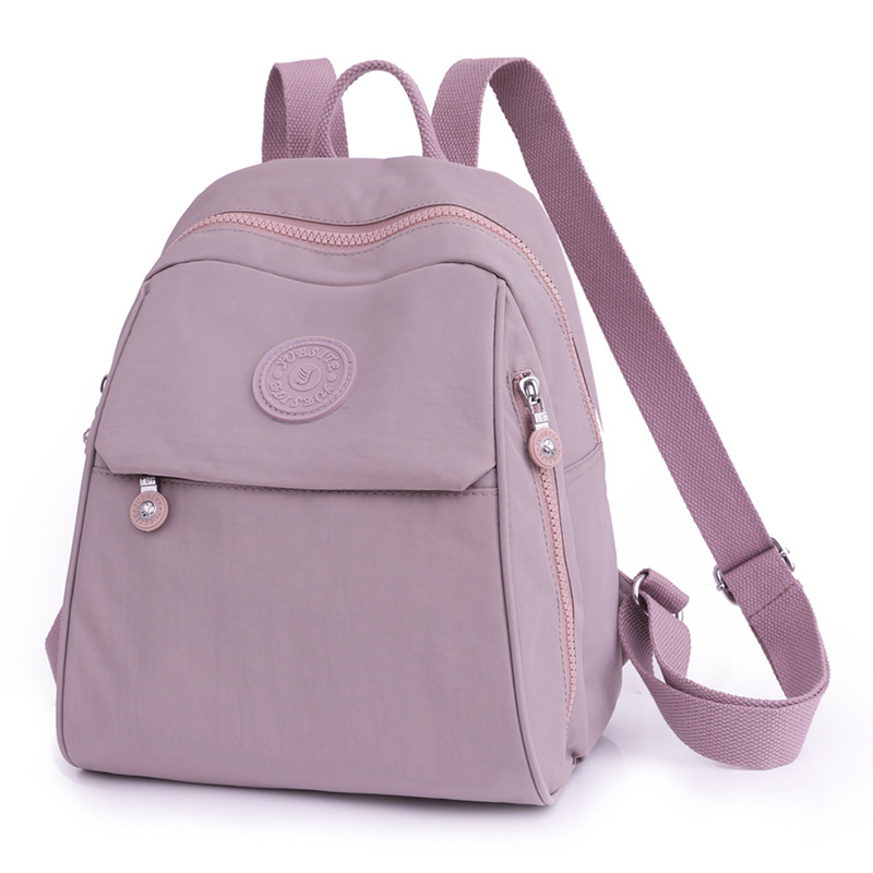 Mochila para mujer, mochila pequeña de tela Oxford de gran capacidad, resistente al agua, nueva mochila escolar de nailon lavanda de todo fósforo de moda