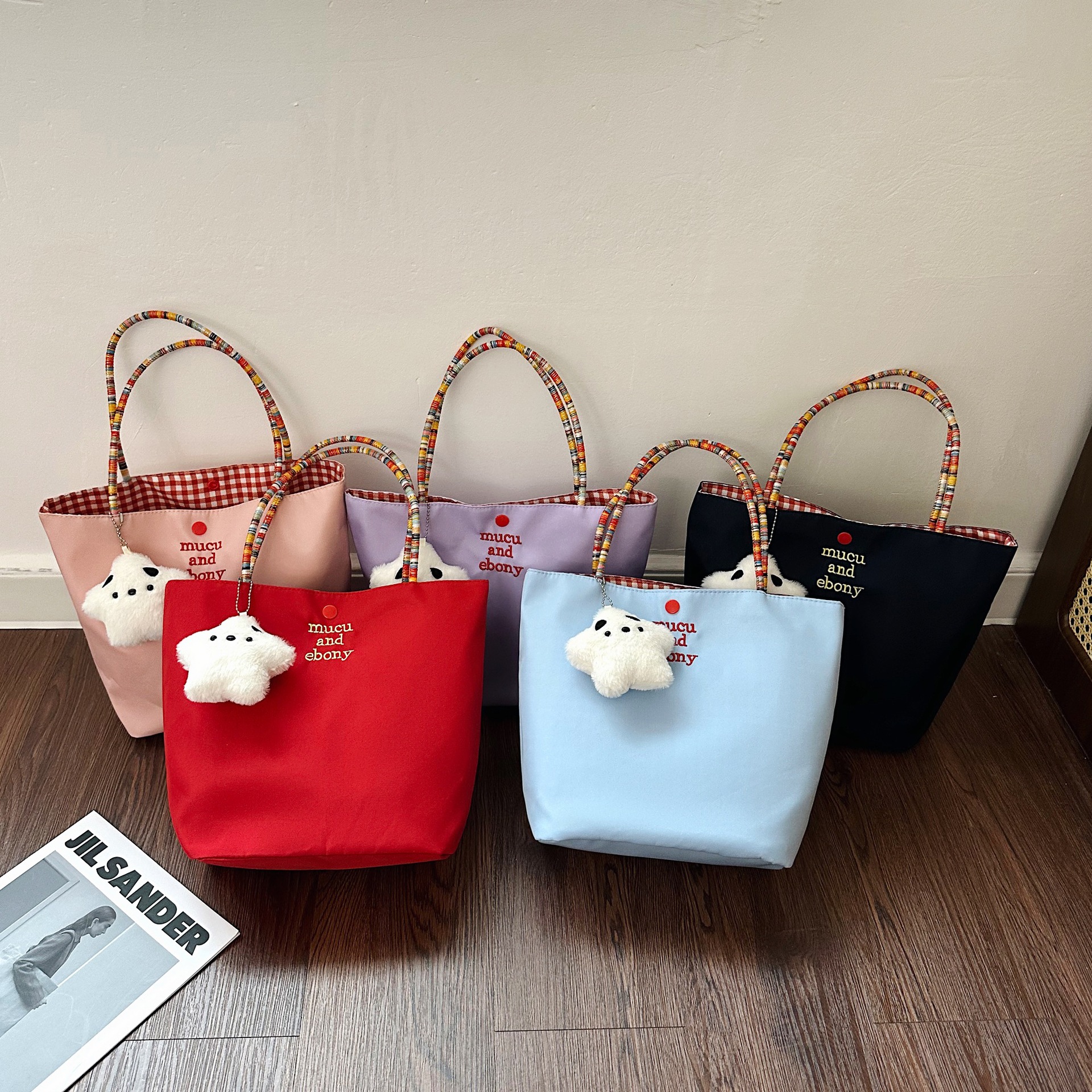 Handheld one-shoulder bag