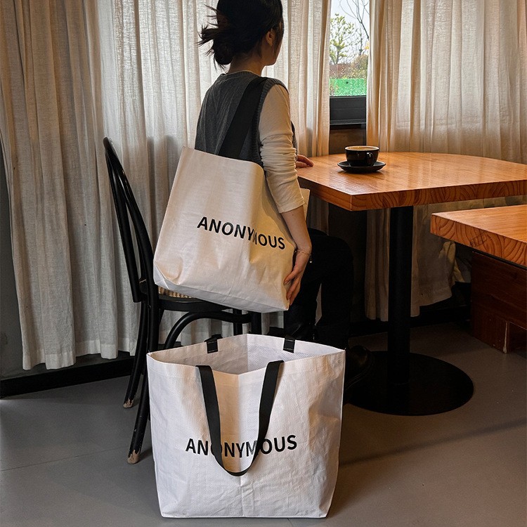 Tienda de ropa de bolsas tejidas bolsas de mano personalizadas impresas logo red Wind bolsas tejidas de alta capacidad bolsas tejidas bolsas de ropa