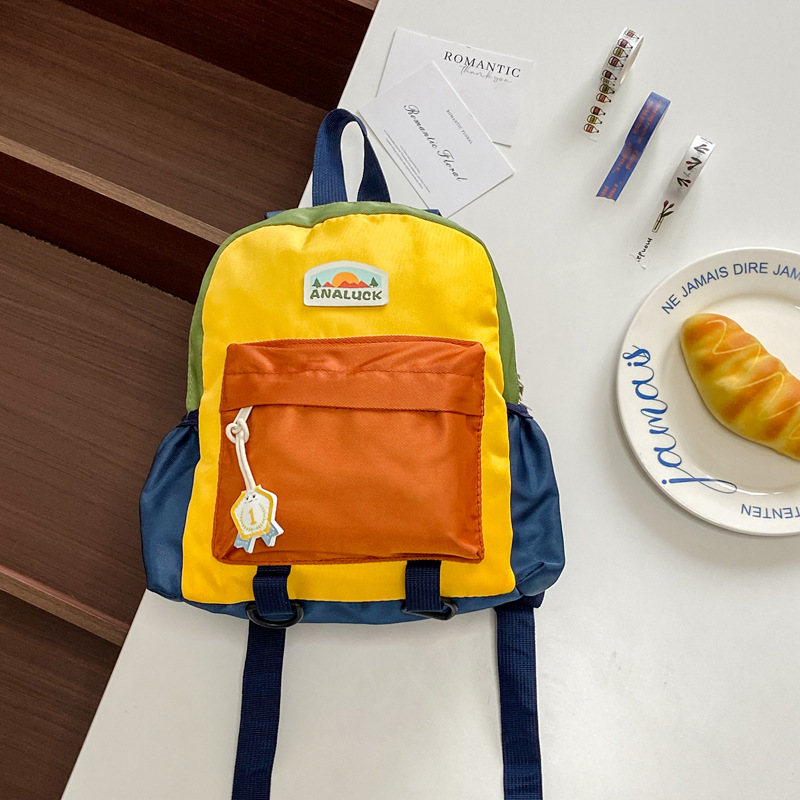 2025 mochila de moda coreana para niños y niñas, mochila para niños de jardín de infantes, nueva mochila para niños de color exterior