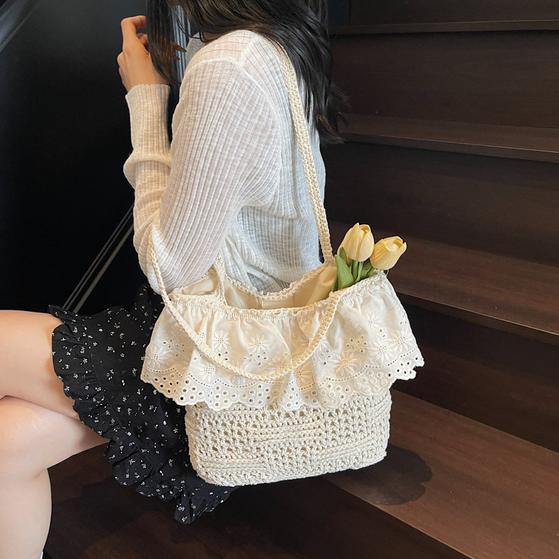 Versión coreana del bolso de nicho 2025 verano nuevo bolso femenino estilo pastoral bolso de punto bolso de hombro de encaje