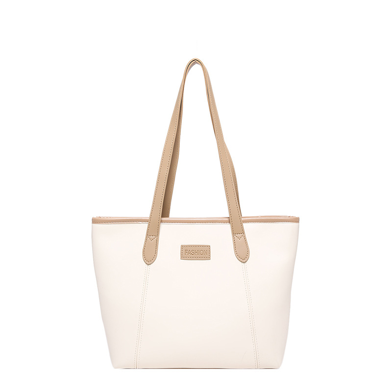 Bolsa de otoño y invierno 2024 nueva bolsa de mujer de viaje de gran capacidad, bolso de hombro de viento simple, bolso de brazo de empalme simple