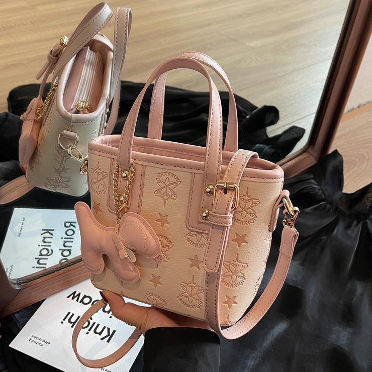 Bolso de mano popular para mujeres 2025 nuevo bolso de cubo de agua de textura casual versátil de alta calidad bolso de hombro