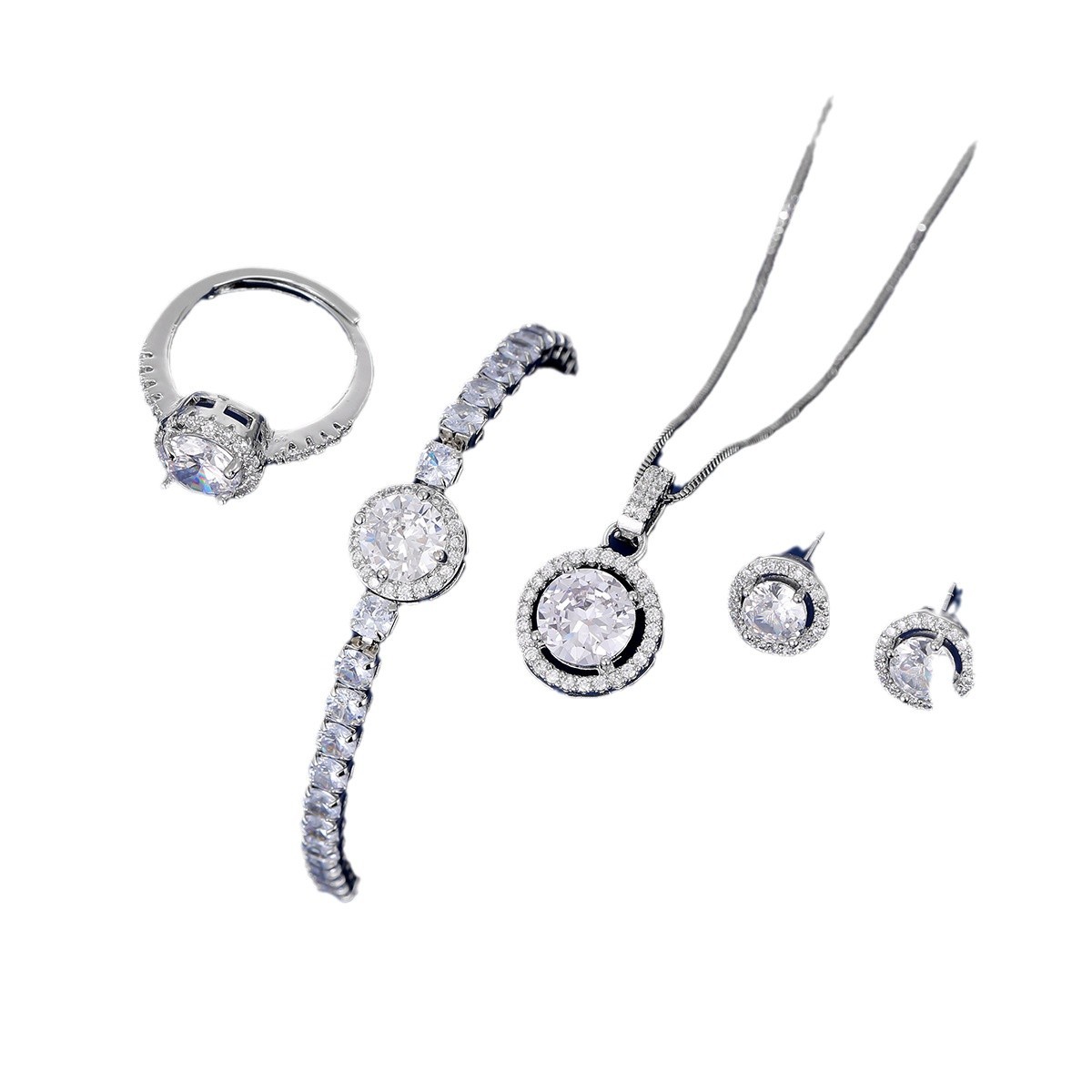 Estilo explosivo Venta caliente Temperamento simple Imitación Moissan Anillo de diamantes Pendientes Pulsera colgante Juego de cuatro piezas Cadena de clavícula en vivo de celebridades de Internet