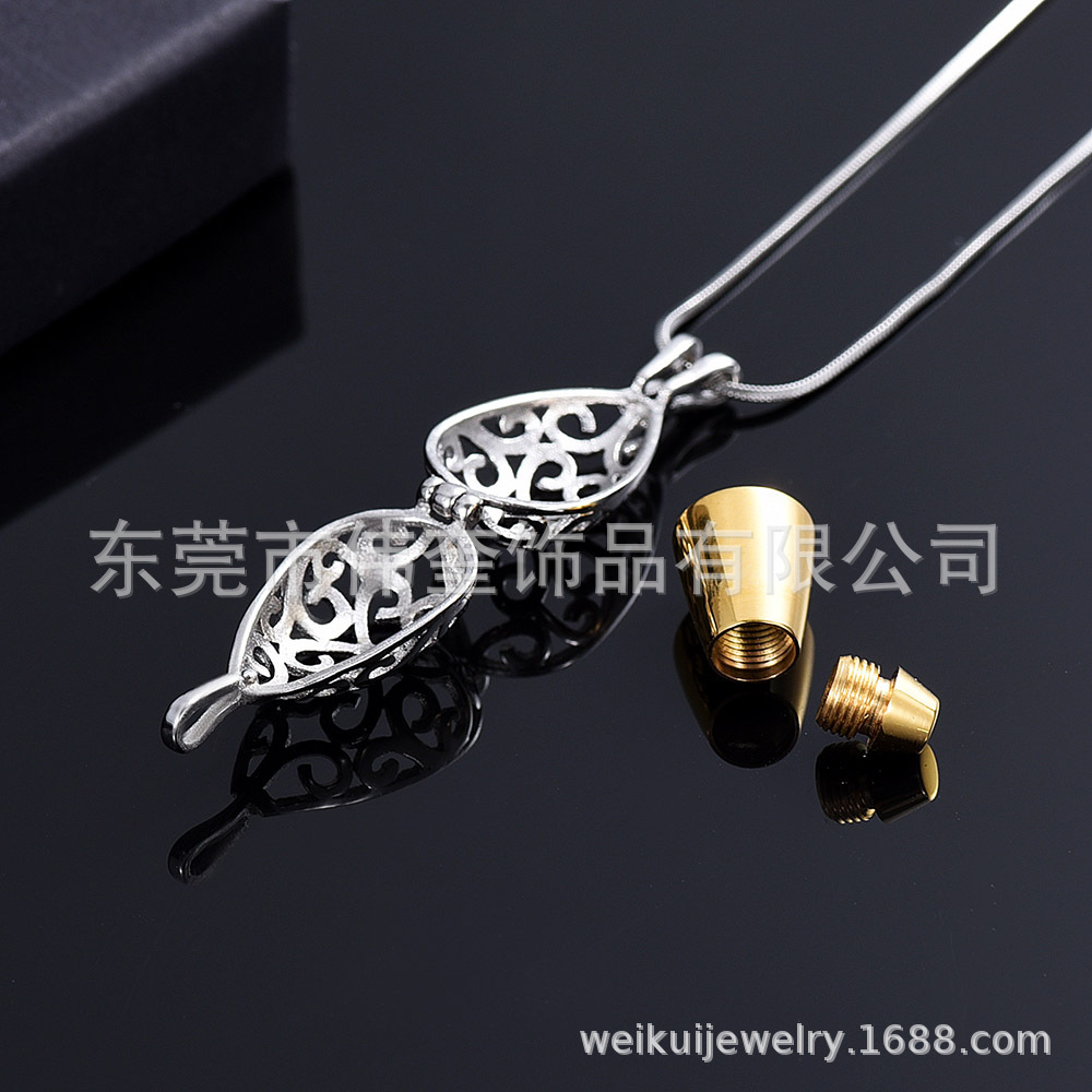 Comercio exterior de la joyería al por mayor de Europa y América de Loto puede abrir mascota cinerario ataúd de acero de titanio colgante collar conmemorativo en stock al por mayor