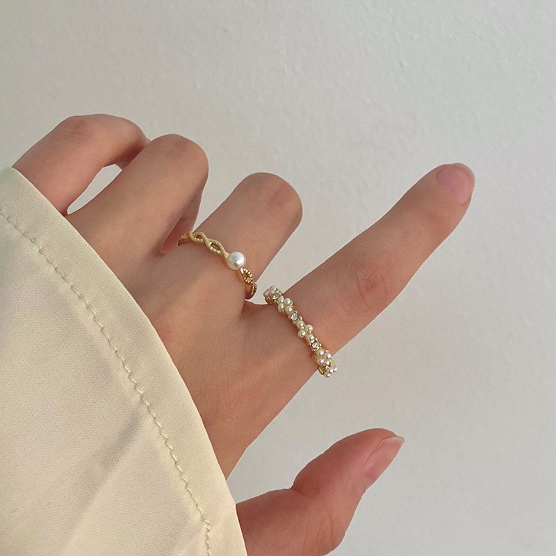 Anillo de circonita de perlas de viento ins, nicho femenino, sentido de alta gama, simple y ligero, anillo de novia de lujo, anillo de apertura de temperamento al por mayor