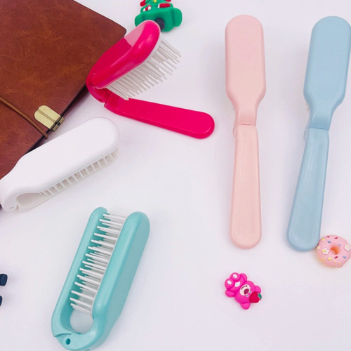 Miniature compact portable girls' home use smooth hair styling massage scalp folding comb small comb