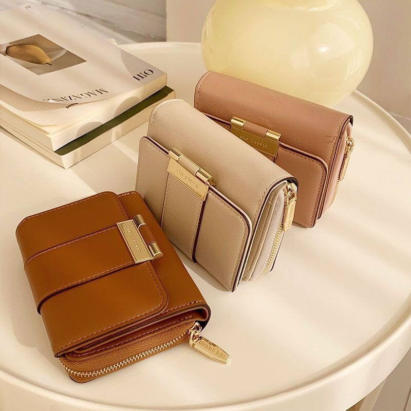 Korean-style short folding wallet for women, trendy and popular among students, with multiple card slots, a compact design, and a unique aesthetic, perfect as a small hand-held coin purse